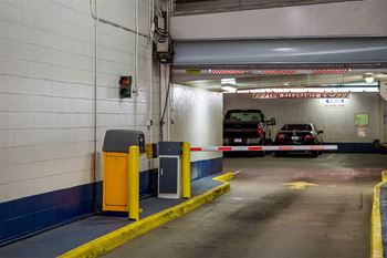 a parking garage with cars parked in it